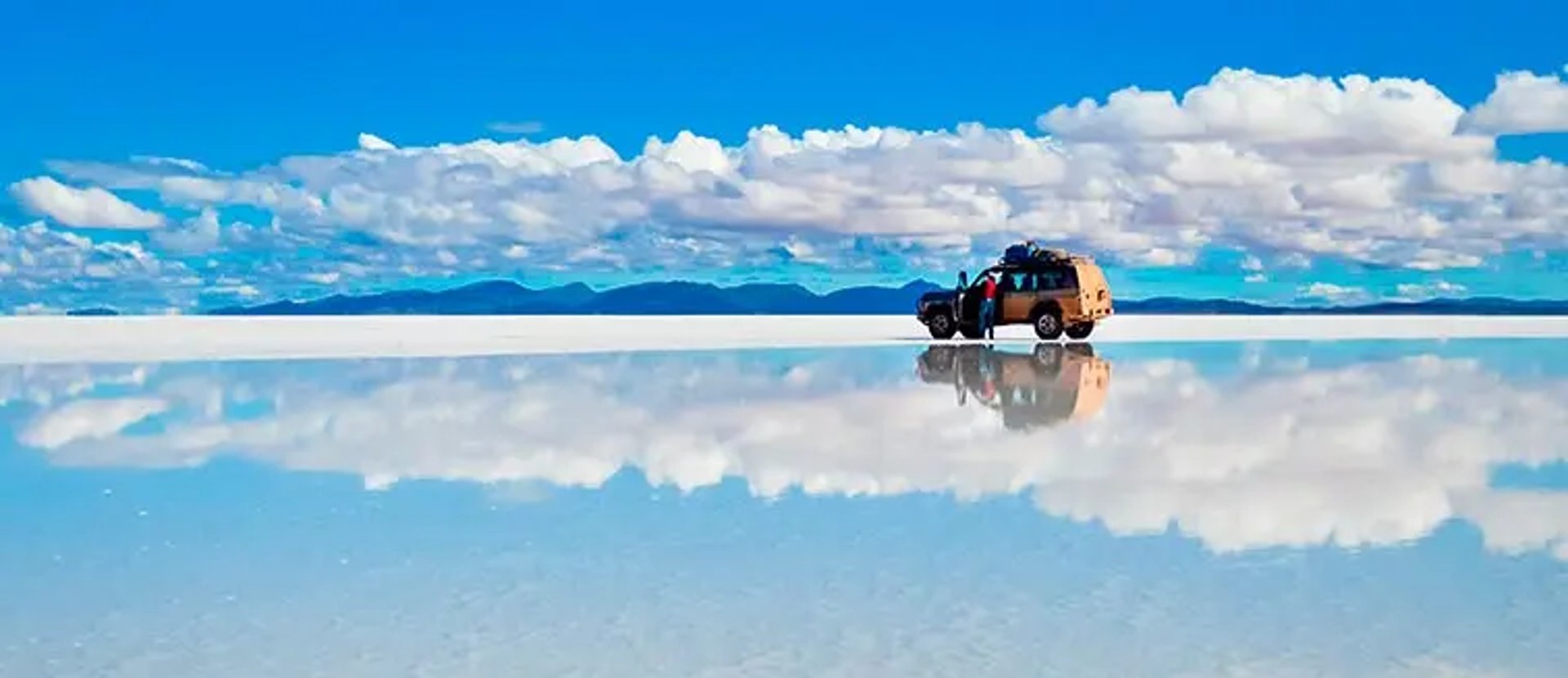 Salar de Uyuni salt flats reflecting the sky, Bolivia